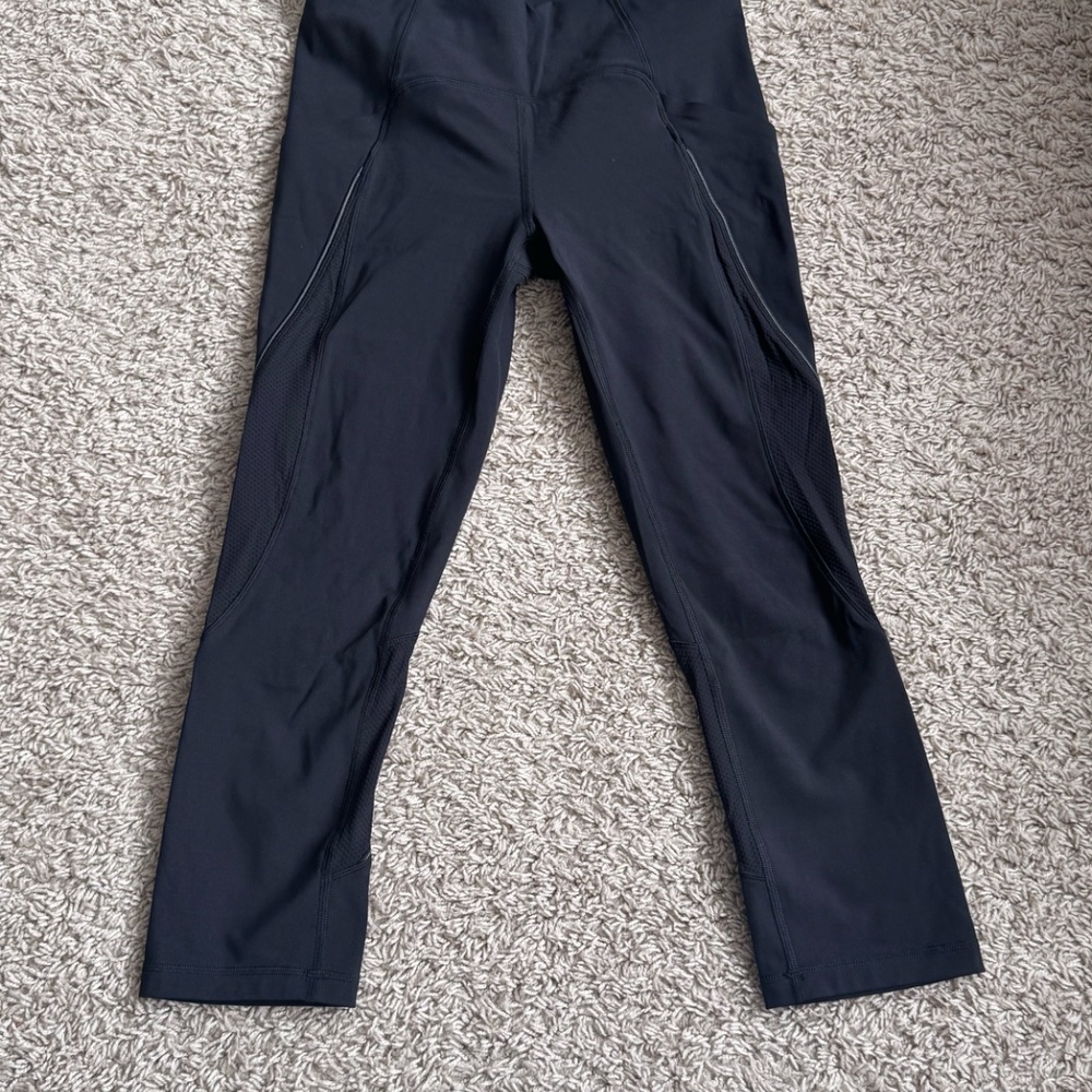The Lululemon Run Off Route Mid-Rise Crop 21" - Picture 2 of 3